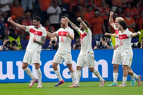 Turkey's Samet Akaydin celebrates after scoring his sides first goal
